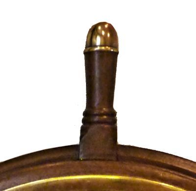 The king pin has a unique brass cap image border=