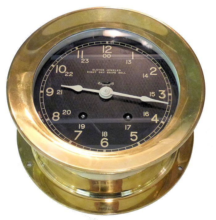 Partial bottom view of string bell ships clock image