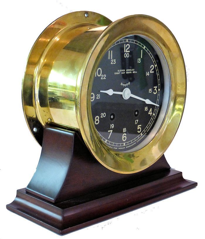 Partial fron view of 12/24 hour Seth Thomas Bells clock image
