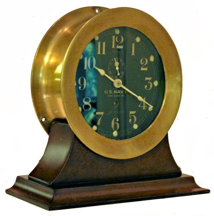 3/4 front view of early Seth Thomas US Navy brass bulkhead clock image