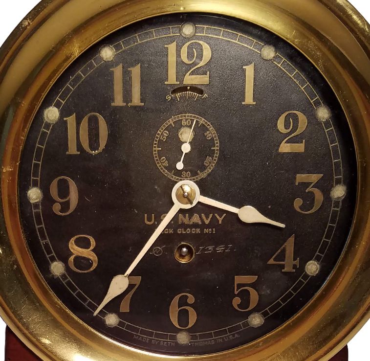 Face of early US Navy brass bulkhead clock image