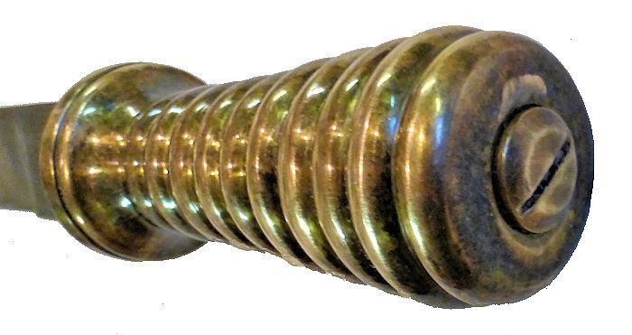 Pommel of French dive knife showing tang screw image