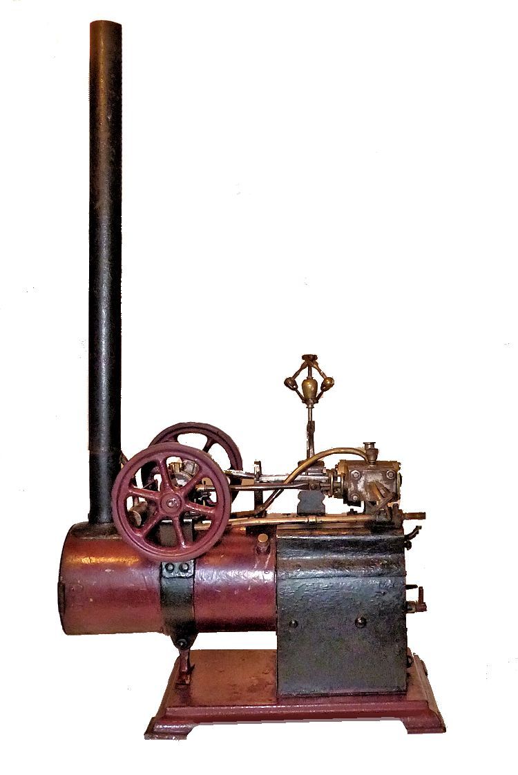 Side view of antique steam engine model image