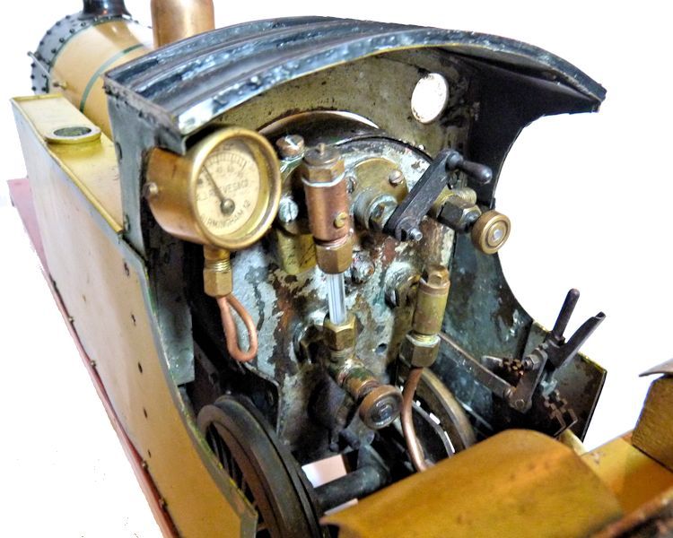 Cab end of live steam engine model showing controls image