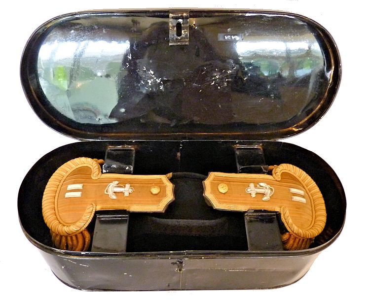 The bicorn, epaulets and sword belt all housed in carrying case image