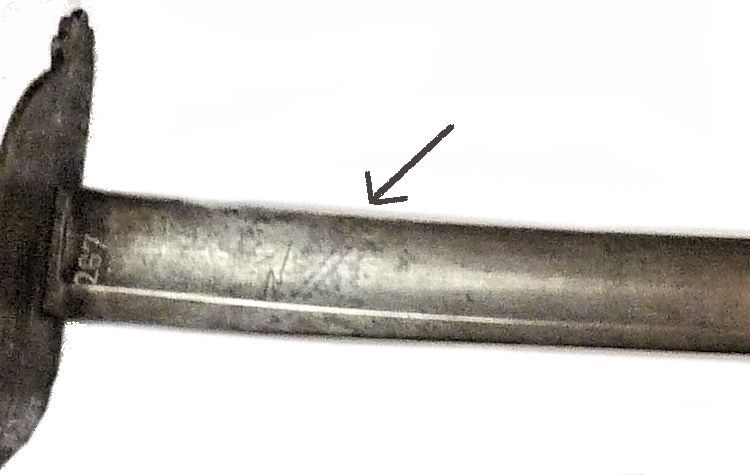 Correct markings of a slanting anchor appear on both sides of the blade image